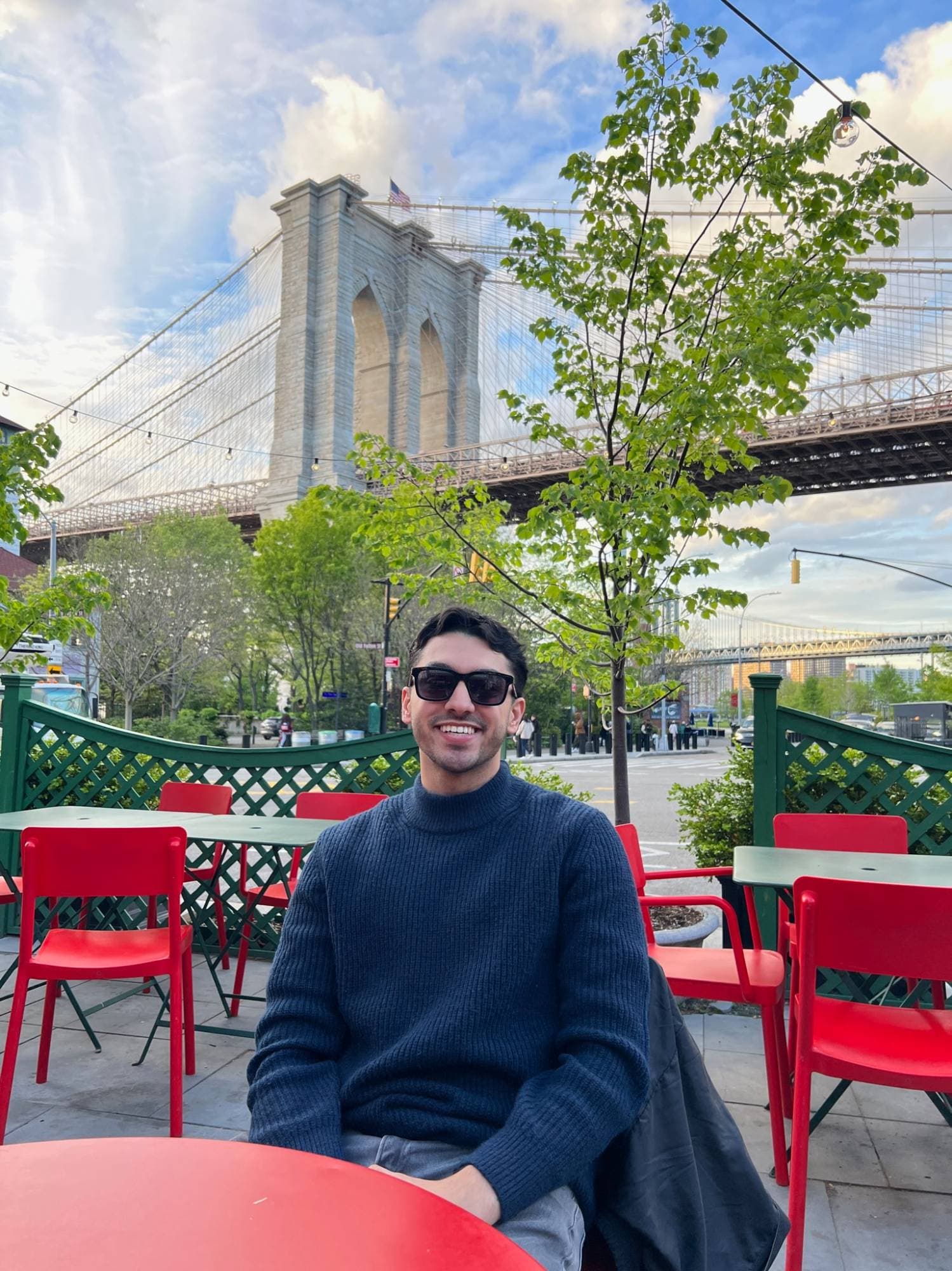 Sameer in DUMBO, under the Brooklyn Bridge