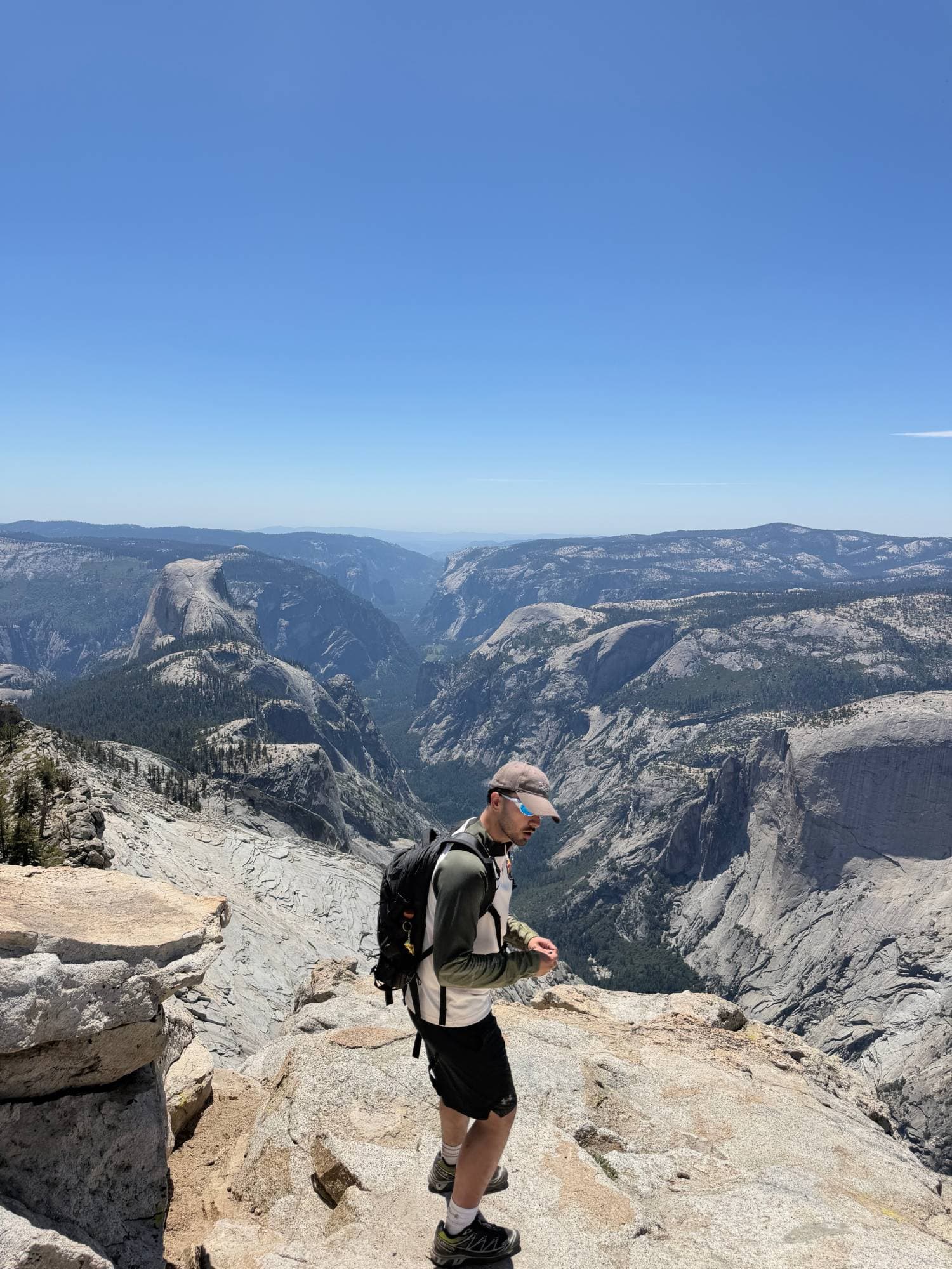Sameer at the top of a hike in Yosemite